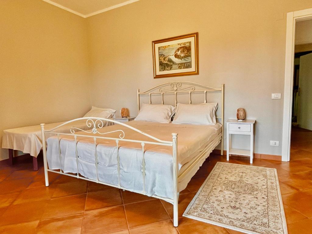 Postel nebo postele na pokoji v ubytování B&B Terre Toscane