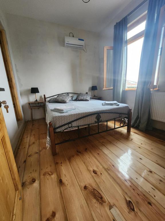Postel nebo postele na pokoji v ubytování Kardanakhi Estate