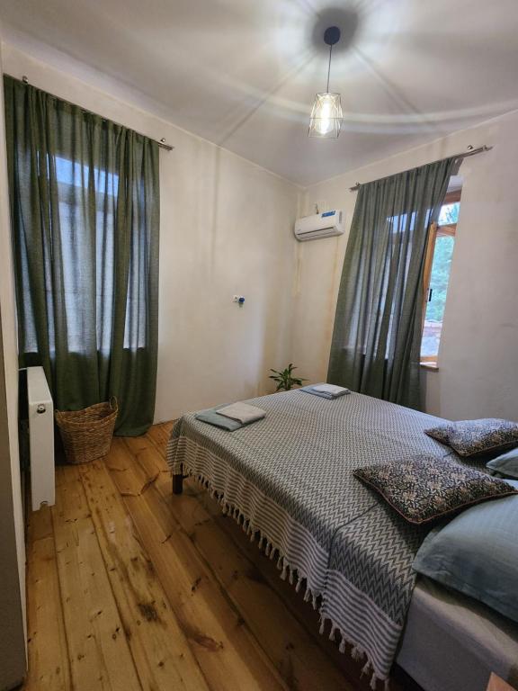 Postel nebo postele na pokoji v ubytování Kardanakhi Estate