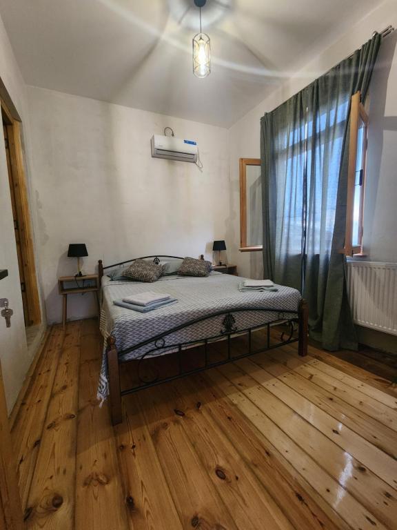 Postel nebo postele na pokoji v ubytování Kardanakhi Estate