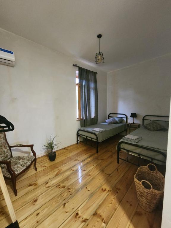 Postel nebo postele na pokoji v ubytování Kardanakhi Estate