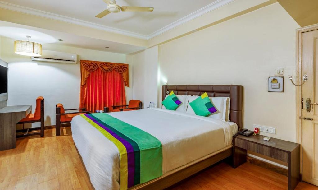 Postel nebo postele na pokoji v ubytování Hotel Crown