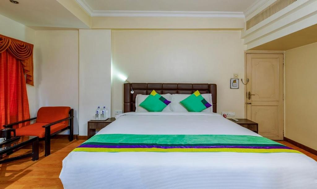 Postel nebo postele na pokoji v ubytování Hotel Crown