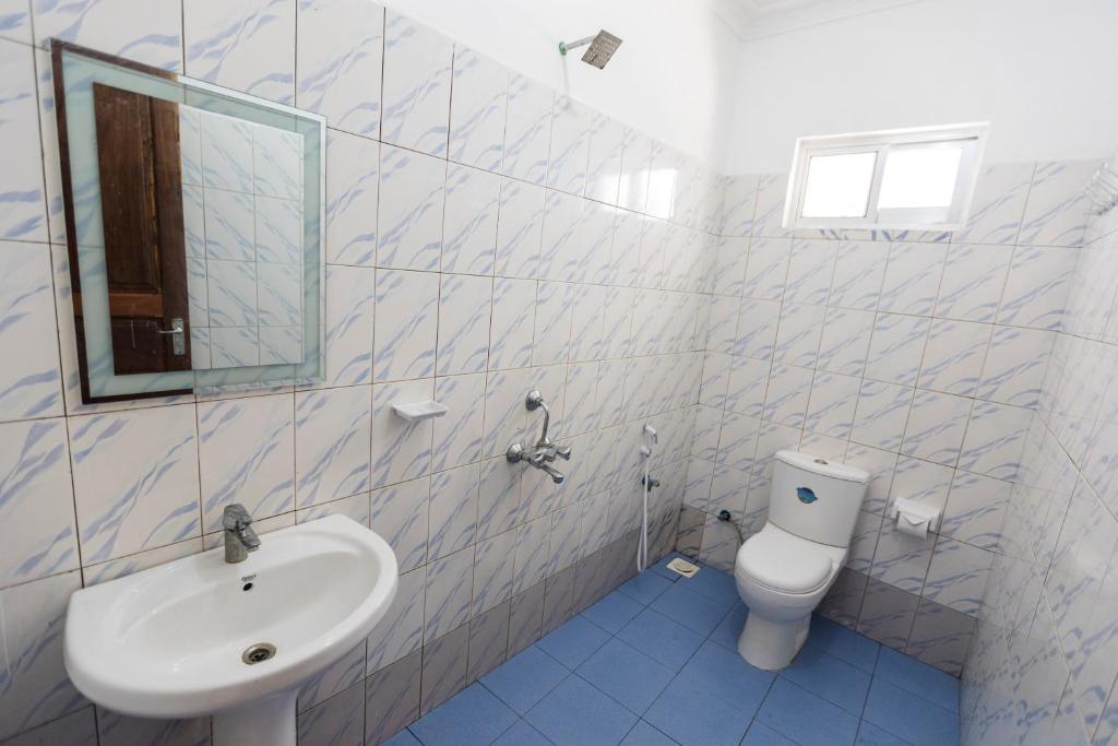 Koupelna v ubytování Kite Active Paje