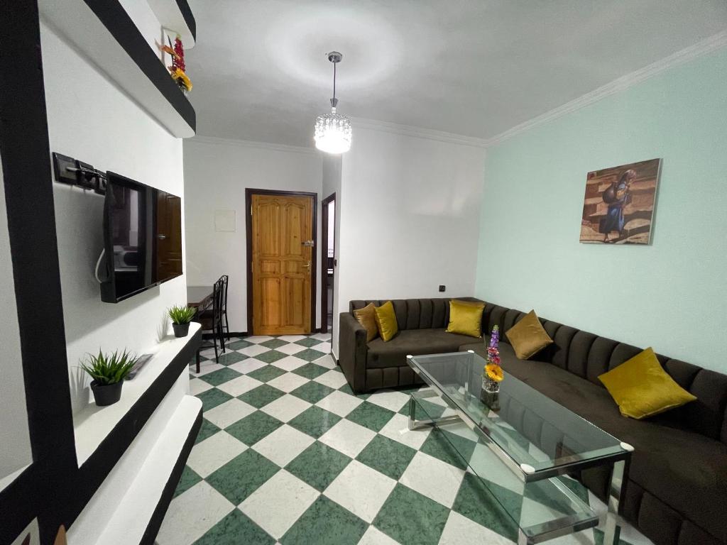TV a/nebo společenská místnost v ubytování Comfy Stay in Larache's Center