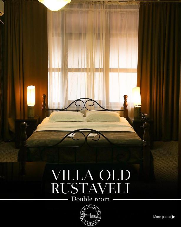 Postel nebo postele na pokoji v ubytování Hotel Old Rustaveli
