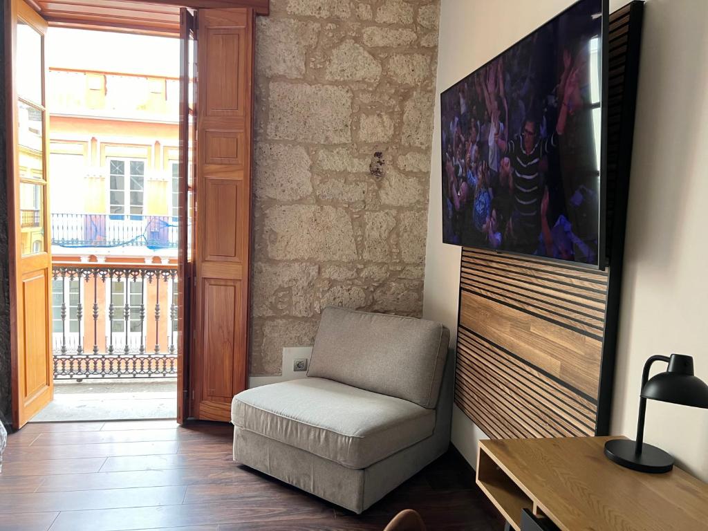 TV a/nebo společenská místnost v ubytování Triana Rooms EH