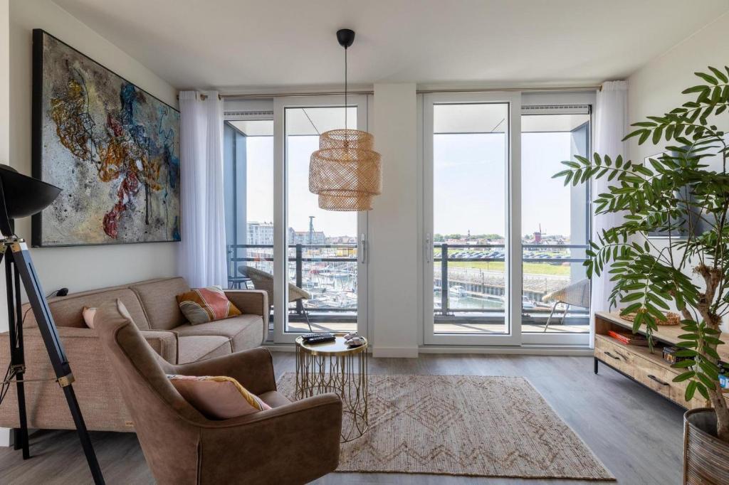 Χώρος καθιστικού στο Vakantiewoning aan het water - met dakterras en balkon - Vista Maris - Nr 40