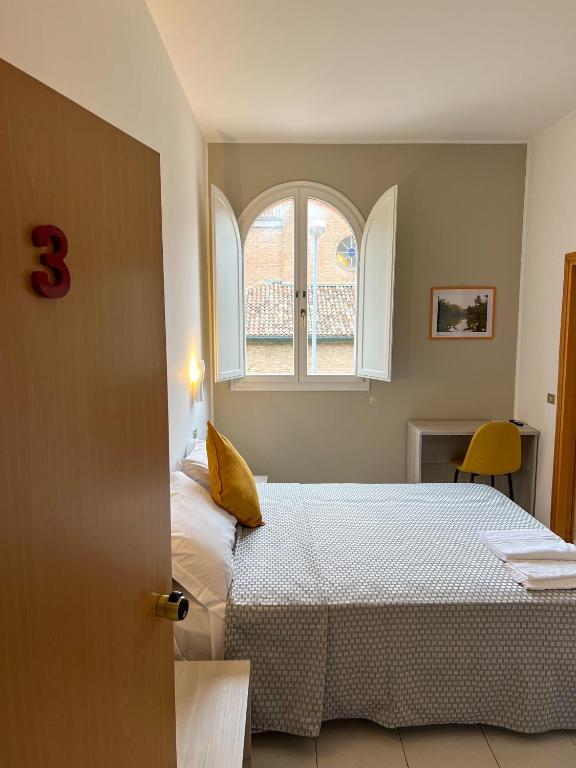 Postel nebo postele na pokoji v ubytování Al Gallo Trattoria e Locanda