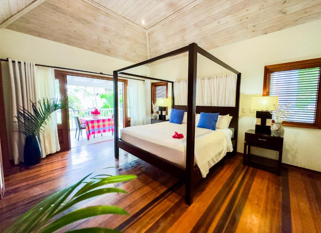 Postel nebo postele na pokoji v ubytování The Hideaway Collection Antigua