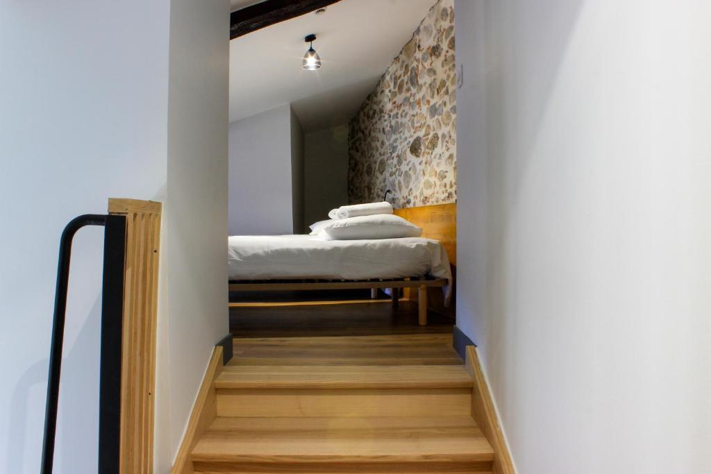 Postel nebo postele na pokoji v ubytování Auberge Le LEO de FOIX