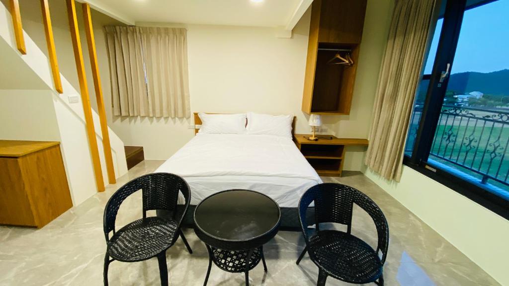 Voodi või voodid majutusasutuse Fu Yu B&B toas