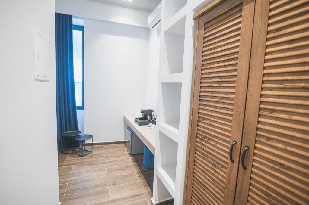 Kuchyň nebo kuchyňský kout v ubytování Downtown Suites by Athens Tower