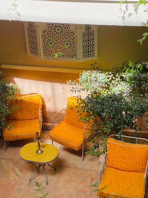 Posezení v ubytování Riad La Calèche & SPA