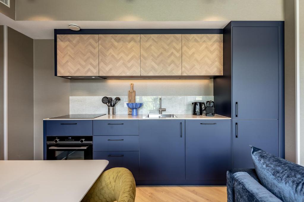 Kuchyň nebo kuchyňský kout v ubytování BizStay Delft