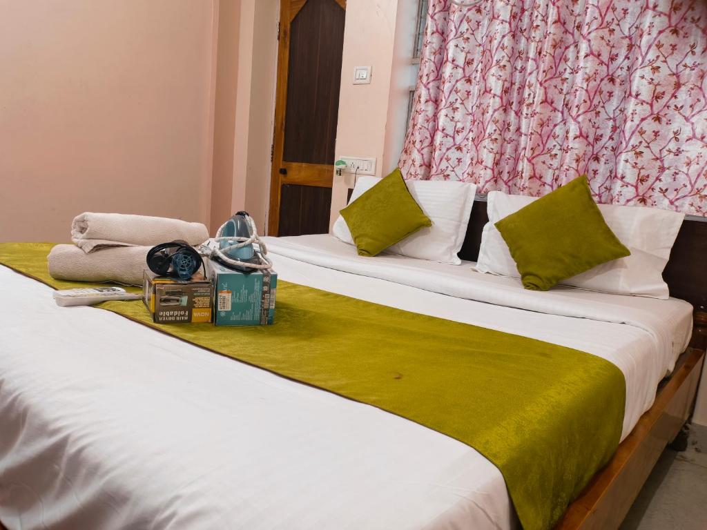 Postel nebo postele na pokoji v ubytování Hotel Bay Beach Inn