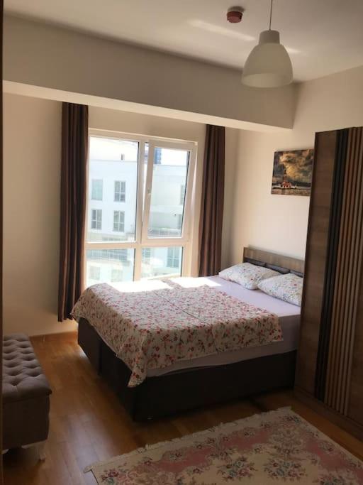 Postel nebo postele na pokoji v ubytování Dubleks şık daire