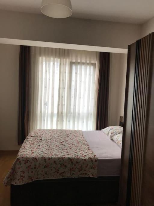 Postel nebo postele na pokoji v ubytování Dubleks şık daire