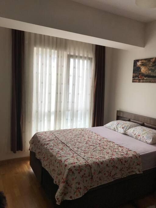 Postel nebo postele na pokoji v ubytování Dubleks şık daire