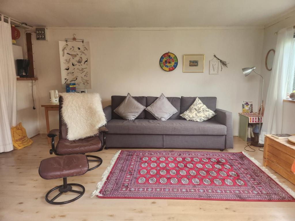 Posezení v ubytování Groovy Getaway - Holiday home with garden