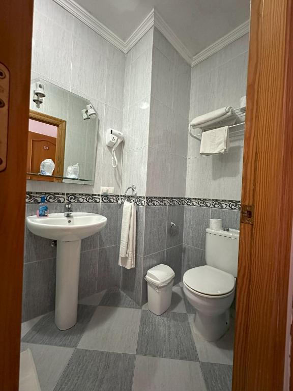 Koupelna v ubytování Hostal Avenida