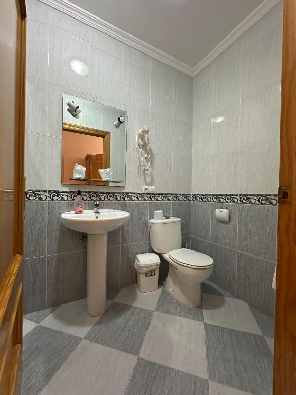 Koupelna v ubytování Hostal Avenida