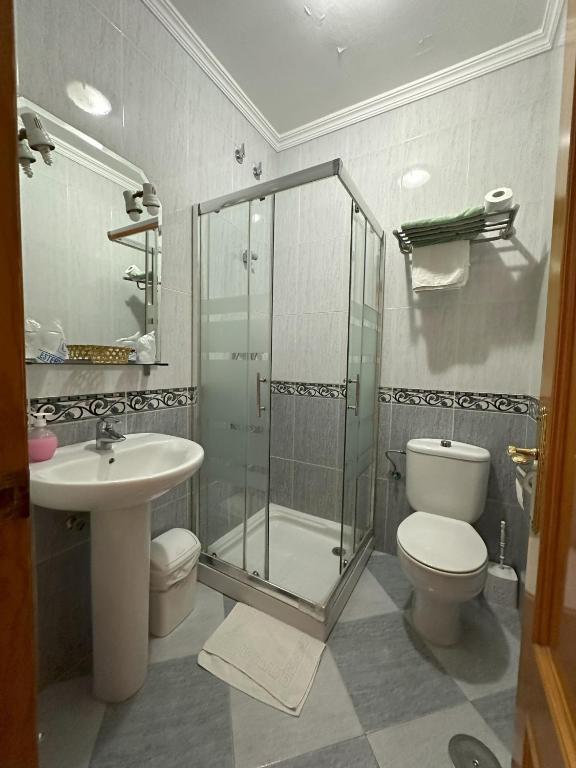 Koupelna v ubytování Hostal Avenida
