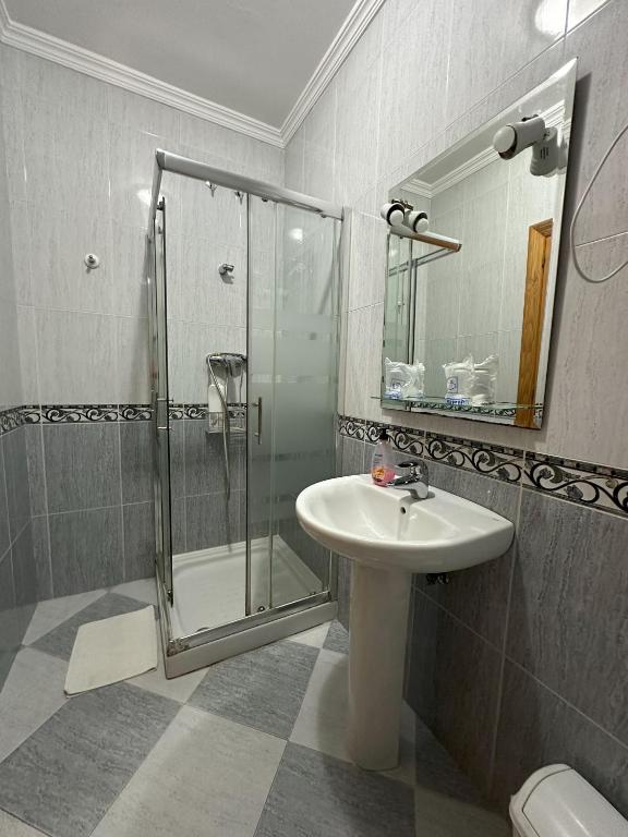 Koupelna v ubytování Hostal Avenida
