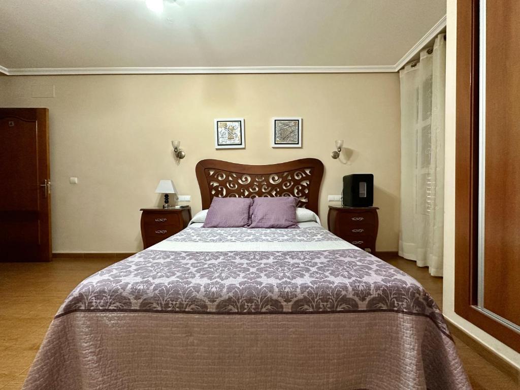 Postel nebo postele na pokoji v ubytování Hostal Avenida
