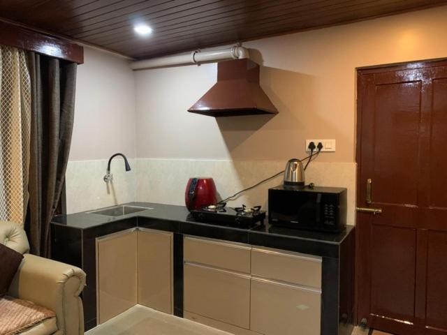 Kuchyň nebo kuchyňský kout v ubytování Donna's Homestay