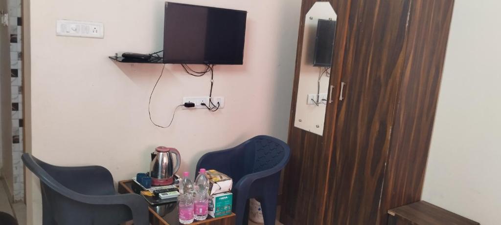 TV a/nebo společenská místnost v ubytování Hotel Bay Beach Inn