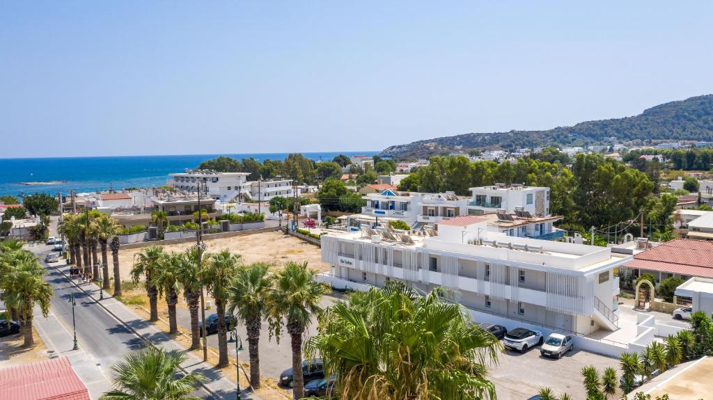 arial view of a city with palm trees at Avi Suites Faliraki in Faliraki