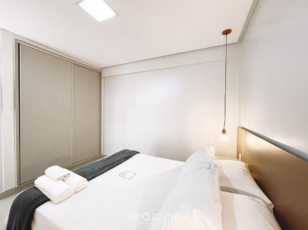 Postel nebo postele na pokoji v ubytování Onix Bueno Residence - ONX