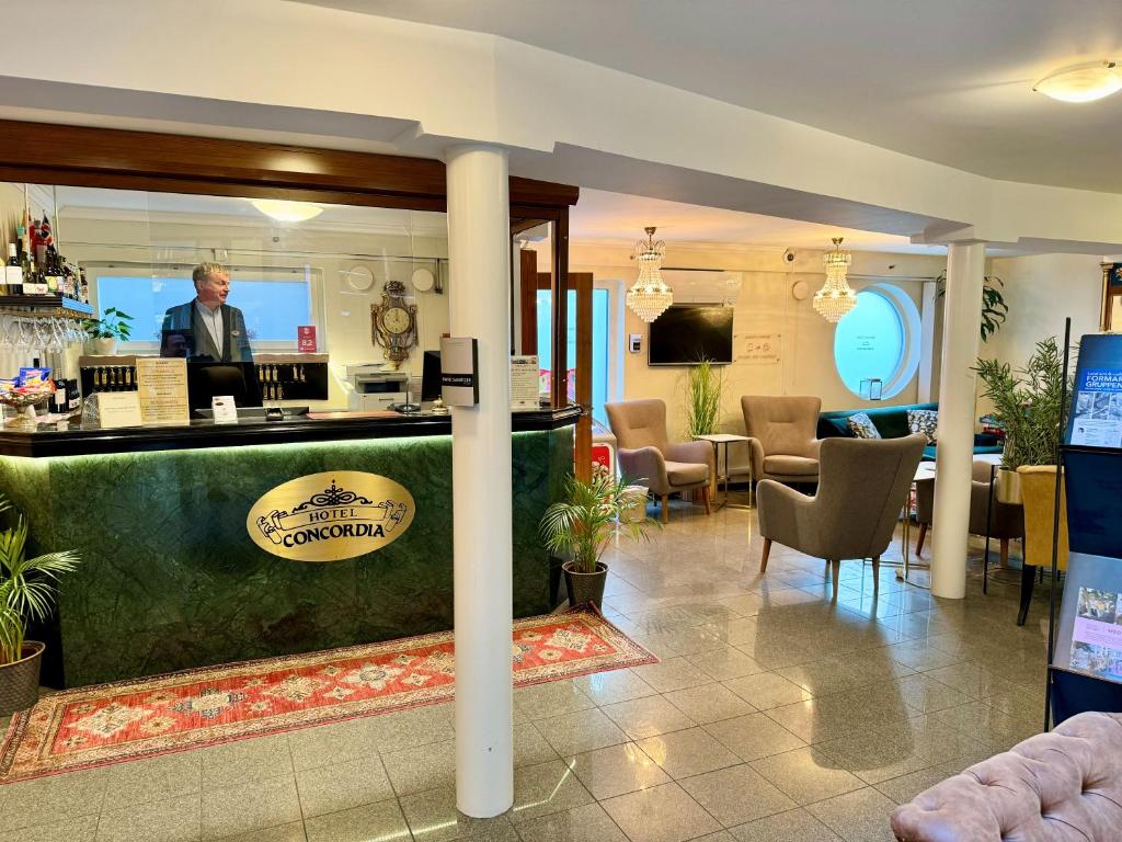 TV a/nebo společenská místnost v ubytování Hotel Concordia