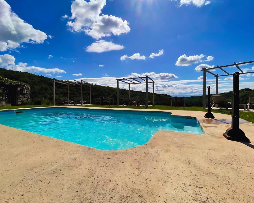 Bazén v ubytování Cascina Facelli - Luxury Country House nebo v jeho okolí