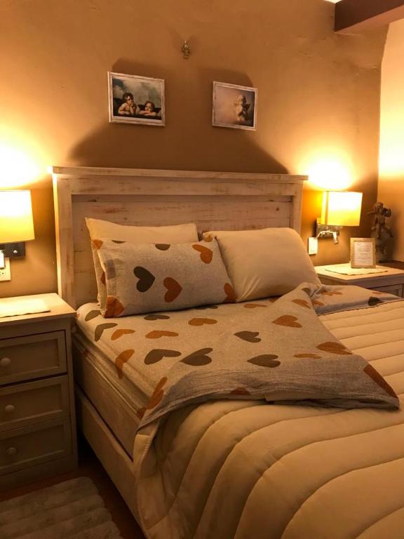 Postel nebo postele na pokoji v ubytování Casa de las Escaleras