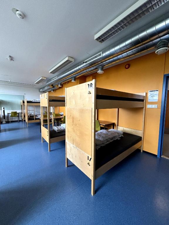Postel nebo postele na pokoji v ubytování Bergen Hostel Montana