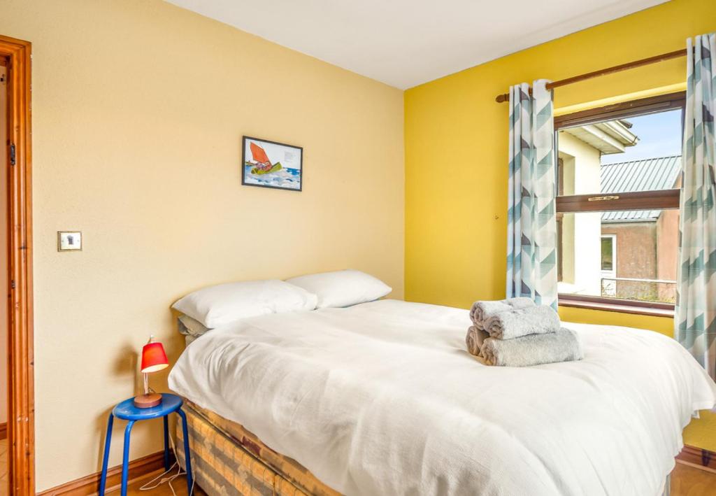 Postel nebo postele na pokoji v ubytování Glynsk Pier Cottage