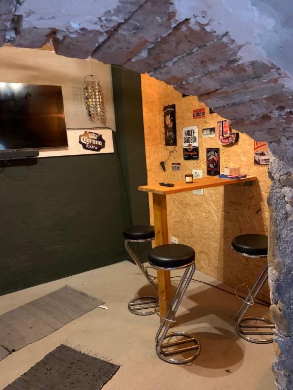 TV a/nebo společenská místnost v ubytování Ferienwohnung in der fränkischen Schweiz