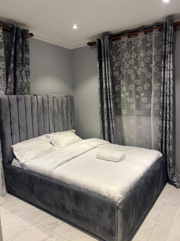 Postel nebo postele na pokoji v ubytování La vue suites