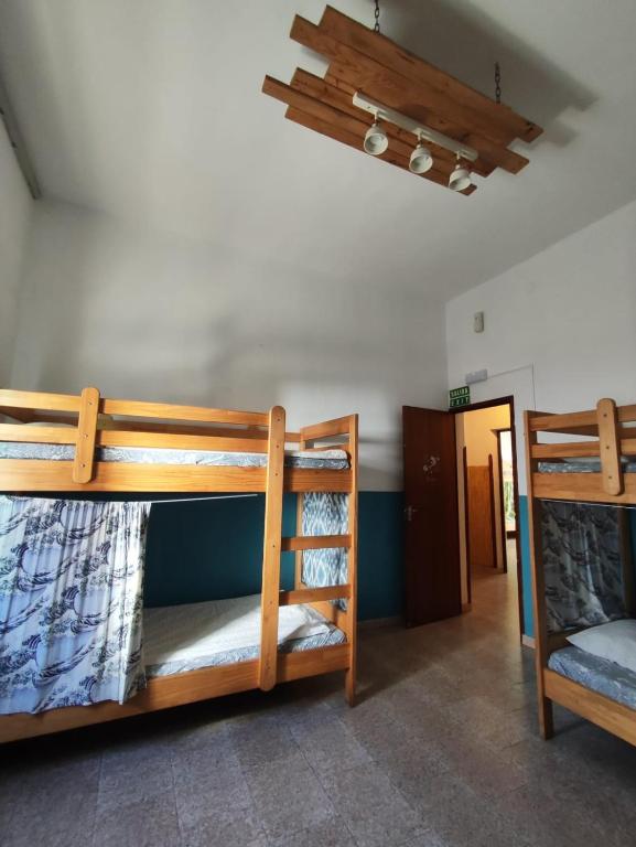 Postel nebo postele na pokoji v ubytování Hostel Vagamundo