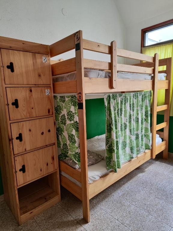 Postel nebo postele na pokoji v ubytování Hostel Vagamundo