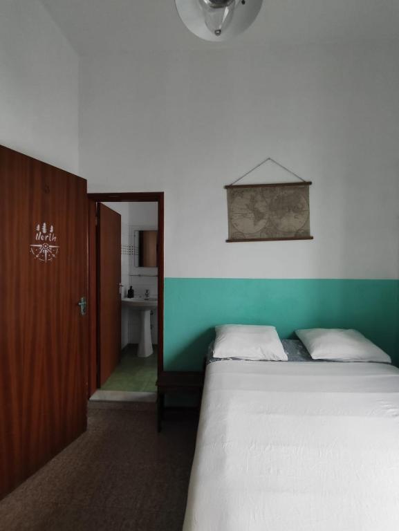 Postel nebo postele na pokoji v ubytování Hostel Vagamundo