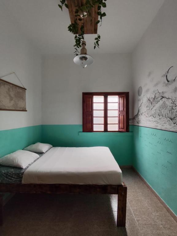 Postel nebo postele na pokoji v ubytování Hostel Vagamundo