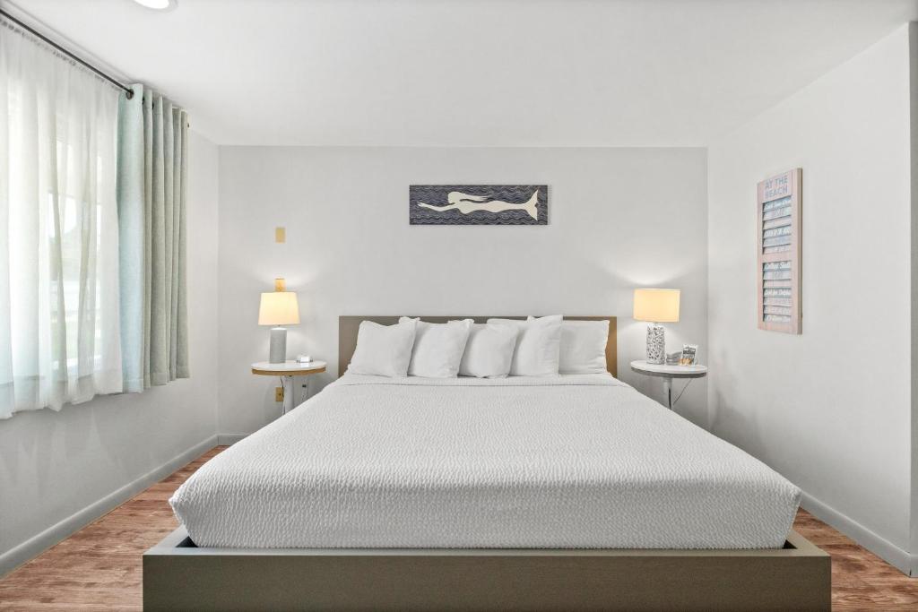 Postel nebo postele na pokoji v ubytování Eagle Wing Inn - Cape Cod