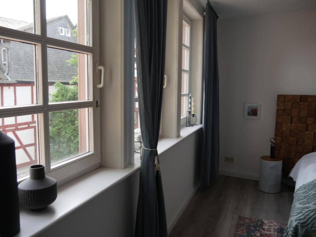 Postel nebo postele na pokoji v ubytování Schlosssteiger