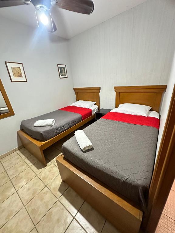 Postel nebo postele na pokoji v ubytování Suites Chingón