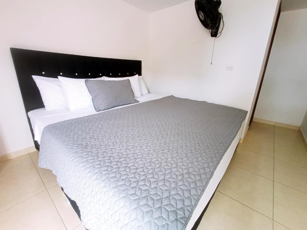 Postel nebo postele na pokoji v ubytování Hotel Resort Campestre Puerta Del Sol - San Gil