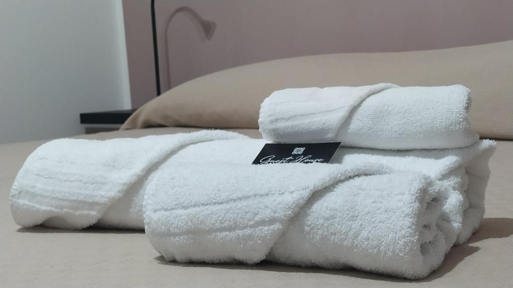 Postel nebo postele na pokoji v ubytování Guest House alla Scala