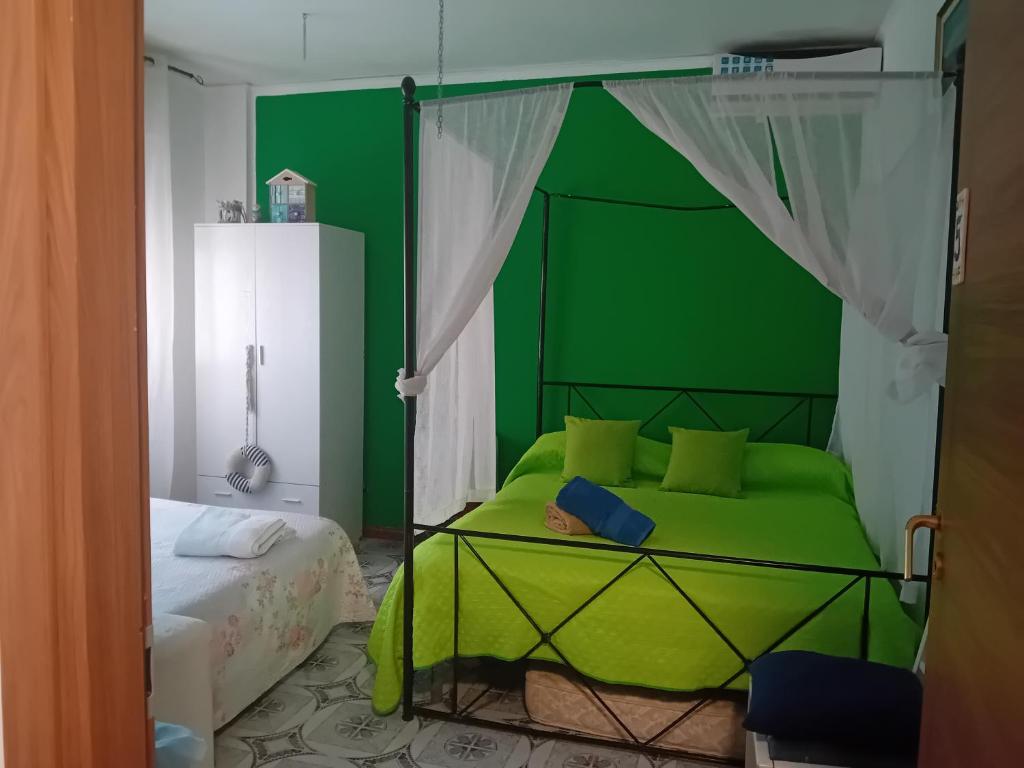 Katil atau katil-katil dalam bilik di Mareluna beach house